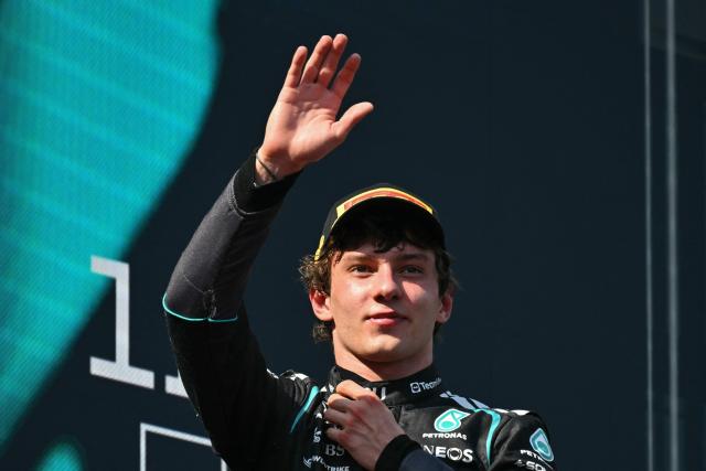 Third placed Mercedes' Italian driver Kimi Antonelli arrives on the podium after the Formula One Austrian Grand Prix at the Red Bull Ring race track in Spielberg, Austria on June 28, 2026. (Photo by Andrej ISAKOVIC / AFP)