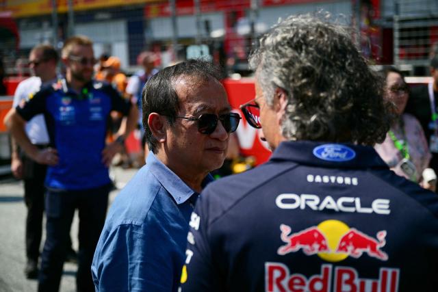 Thai billionaire businessman and co-owner of 
Red Bull GmbH Chalerm Yoovidhya (L) speaks with Red Bull Racing's British team principal Laurent Mekies prior to the Formula One Austrian Grand Prix at the Red Bull Ring race track in Spielberg, Austria on June 28, 2026. (Photo by Andrej ISAKOVIC / AFP)