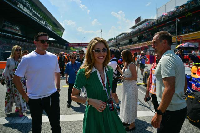 Austrian TV host Victoria Swarovski (C) and her partner Mark Mateschitz (L), Austrian co-owner of Red Bull attend the Formula One Austrian Grand Prix at the Red Bull Ring race track in Spielberg, Austria on June 28, 2026. (Photo by Andrej ISAKOVIC / AFP)