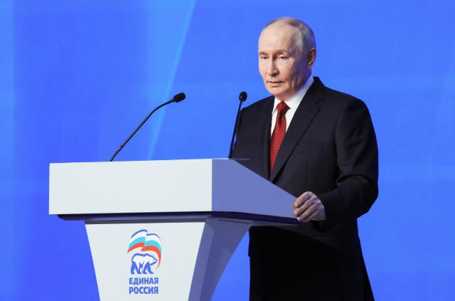 In this pool photograph distributed by Russian state agency Sputnik, Russia's Vladimir Putin addresses the audience at the 23rd Congress of the United Russia party in Moscow on June 28, 2026. Vladimir Putin vowed on June 28, 2026 to ensure security and overcome challenges as Ukraine stepped up its retaliatory strikes inside Russia amid Moscow's four-year war. (Photo by Yekaterina SHTUKINA / POOL / AFP)
