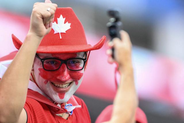 A Canadian fan smiles ahead of the 2026 World Cup round of 32 football match between South Africa and Canada at the Los Angeles Stadium in Inglewood on June 28, 2026.  (Photo by Patrick T. Fallon / AFP)