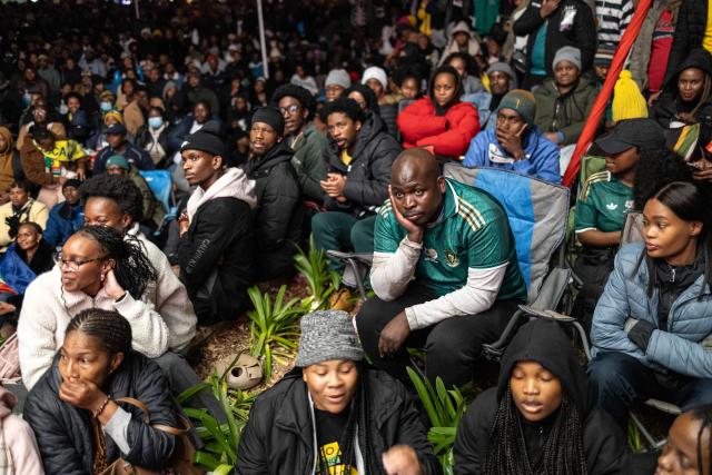 South Africa's supporters react as they watch a live broadcast of the 2026 World Cup round of 32 football match between South Africa and Canada at the Loftus Versfeld Stadium in Pretoria, on June 28, 2026. (Photo by EMMANUEL CROSET / AFP)