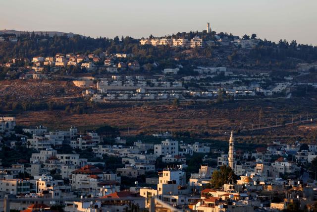 General view of the Palestinian village of Turmus Ayya, north of Ramallah in the occupied West Bank, with the Israeli settlement of Shilo visible in the background, on June 28, 2026. Violence has escalated in the West Bank, which Israel has occupied since 1967, since the start of the Gaza war in October 2023. (Photo by Zain JAAFAR / AFP)
