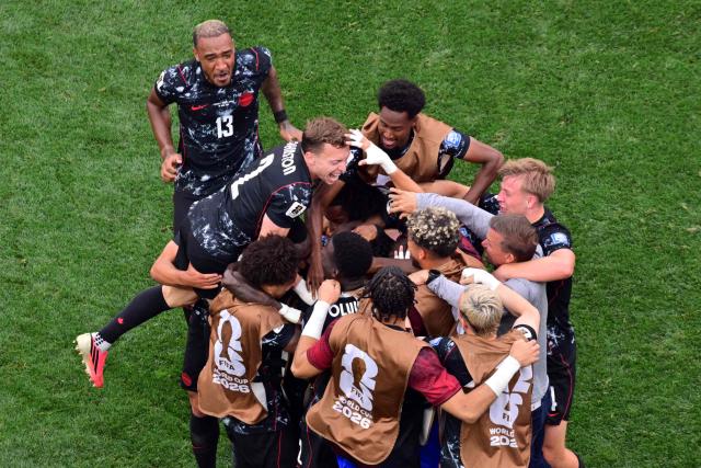 Canada's midfielder #07 Stephen Eustaquio celebrates scoring his team's first goal with teammates during the 2026 World Cup round of 32 football match between South Africa and Canada at the Los Angeles Stadium in Inglewood on June 28, 2026.  (Photo by Frederic J. Brown / AFP)
