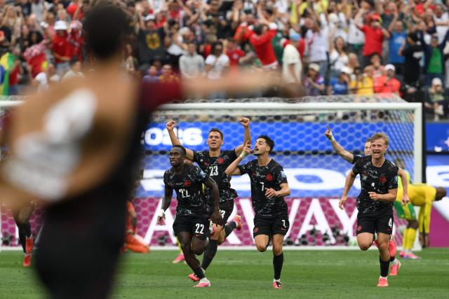Canada's midfielder #07 Stephen Eustaquio celebrates scoring his team's first goal during the 2026 World Cup round of 32 football match between South Africa and Canada at the Los Angeles Stadium in Inglewood on June 28, 2026.  (Photo by Patrick T. Fallon / AFP)