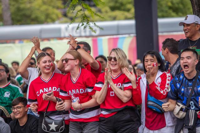 Canada fans celebrate Eustaquio 's goal as they watch the 2026 World Cup football tournament Round of 32 match between South Africa and Canada at the FIFA Fan Festival at Union Station in Downtown Los Angeles on June 28, 2026. (Photo by Apu GOMES / AFP)