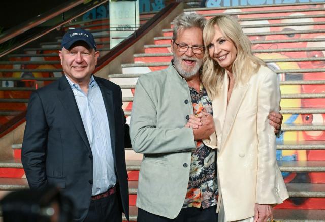 CEO of Illumination Chris Meledandri with US actors Jeff Bridges and Allison Janney attend the premiere of "Minions & Monsters" at the Dolby Theatre in Hollywood, California, on June 28, 2026. (Photo by LISA O'CONNOR / AFP)