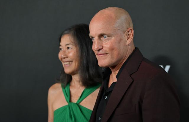 US actor Woody Harrelson and his wife Laura Louie arrive for the 27th Mark Twain Prize for American Humor Gala at the Kennedy Center in Washington, DC, on June 28, 2026. (Photo by Alex WROBLEWSKI / AFP)
