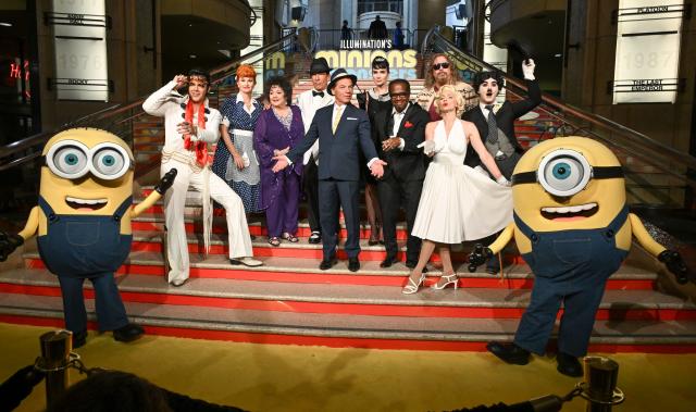 People dressed as different characters attend the premiere of "Minions & Monsters" at the Dolby Theatre in Hollywood, California, on June 28, 2026. (Photo by LISA O'CONNOR / AFP)