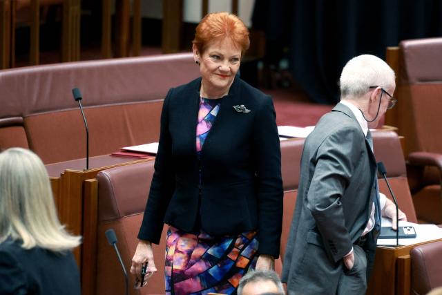Senator and leader of the One Nation Party Pauline Hanson walks in the senate chamber in Parliament House in Canberra on June 29, 2026. (Photo by DAVID GRAY / AFP)