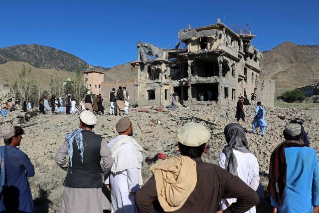 Afghan residents look at the remains of a building damaged in a Pakistani airstrike at a village in Afghanistan's Paktia province on June 29, 2026. Pakistan carried out airstrikes overnight in eastern Afghanistan, Islamabad said on June 29, adding its operations had targeted militants as the Afghan government reported dozens of civilian casualties. (Photo by AFP)