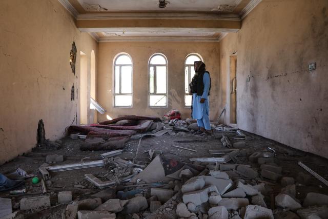 An Afghan resident looks at the remains of a building damaged in a Pakistani airstrike at a village in Afghanistan's Paktia province on June 29, 2026. Pakistan carried out airstrikes overnight in eastern Afghanistan, Islamabad said on June 29, adding its operations had targeted militants as the Afghan government reported dozens of civilian casualties. (Photo by AFP)