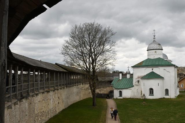 People visit the ancient Russian fortress of Izborsk in the Pskov region, some 850 km (528 miles) northwest of Moscow, on April 19, 2026. (Photo by Olga MALTSEVA / AFP)