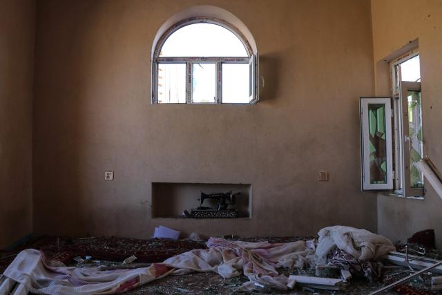 Remains of a damaged building lie amid shards of broken windows after a Pakistani airstrike at a village in Tsamkani district of Afghanistan's Paktia province on June 29, 2026. Pakistan carried out airstrikes overnight in eastern Afghanistan, Islamabad said on June 29, adding its operations had targeted militants as the Afghan government reported dozens of civilian casualties. (Photo by AFP)