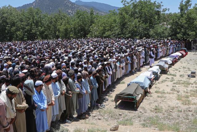 Afghan mourners and relatives offer funeral prayers for Pakistani airstrike victims at a village in Tsamkani district of Afghanistan's Paktia province on June 29, 2026. Pakistani airstrikes killed dozens of people overnight in eastern Afghanistan, with Islamabad saying on June 29 it targeted militants but the Afghan government reporting civilian casualties. (Photo by AFP)