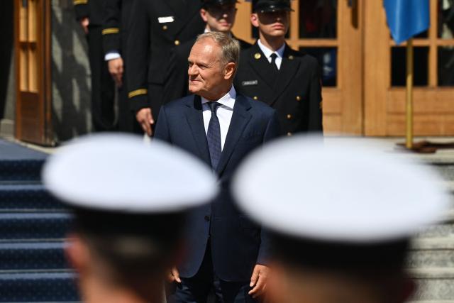 Polish Prime Minister Donald Tusk awaits Sweden's Prime Minister Ulf Kristersson prior to an official welcome ceremony on June 29, 2026 in Gdynia, Poland. Sweden's Prime Minister Ulf Kristersson and several of his ministers travelled to Gdynia, Poland for intergovernmental consultations. The focus will be on strengthened bilateral cooperation between Sweden and Poland, specifically with regard to regional security and defence. (Photo by Marcin Gadomski / AFP)