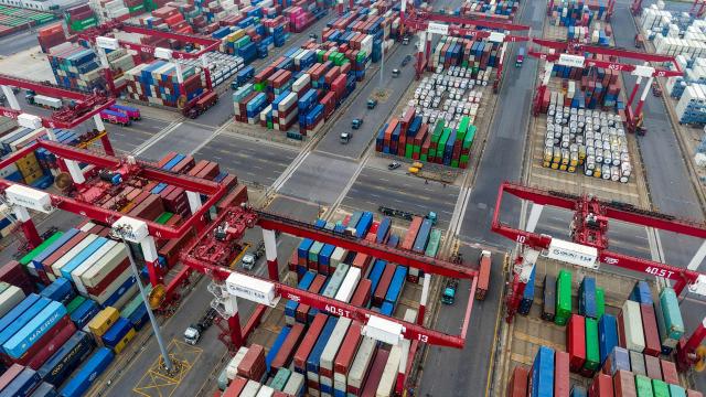 This aerial photo shows containers at a port in Qingdao, China’s eastern Shandong province on June 29, 2026. (Photo by CN-STR / AFP) / China OUT