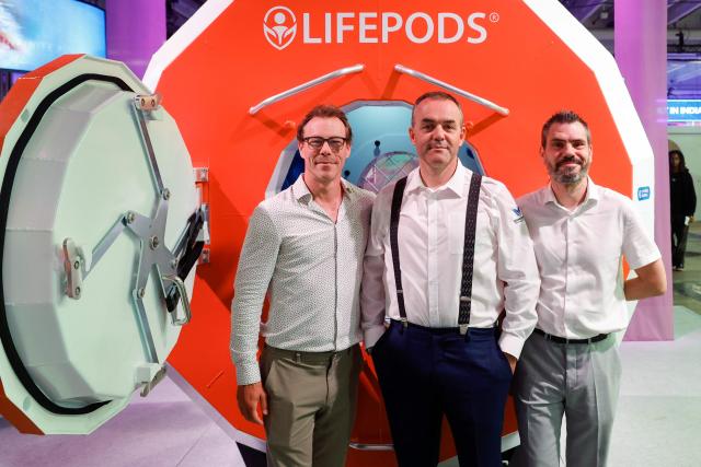 View of Cédric Choffat, founder and CEO of French company Momentum Technologies, on the center,  poses in front of the LIFEPODS W-01 survival capsule during the VivaTech 2026 technology trade show at Paris Expo Porte de Versailles in Paris, France, on June 18, 2026. https://mediaconnect.com/lifepods-unveils-its-next-generation-survival-capsules-at-vivatech-and-eurosatory-2026?lang=en (Photo by GEOFFROY VAN DER HASSELT / LifePods / Momentum Technologies / FACTSTORY) / Disclaimer: This document is neither produced nor endorsed by AFP. It is distributed under its issuer sole responsibility. Its reproduction is authorized in context without any distortion of content. If you have any question about this document, please contact its issuer.