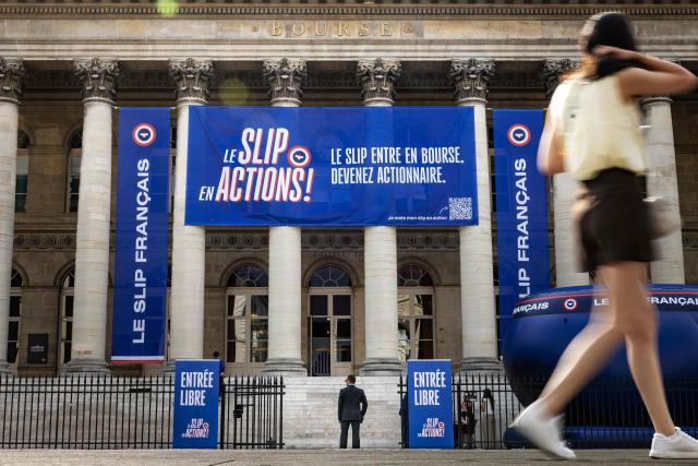 This photograph shows banners hanging on the Palais Brongniart to announce the IPO of the company "Le Slip Français" on June 29, 2026. The underwear brand Le Slip français, one of the leaders of the "made in France" movement, announced on June 25, 2026 that it will go public on the symbolic date of July 14, hoping to raise 5 million euros in fresh capital. (Photo by JOEL SAGET / AFP)