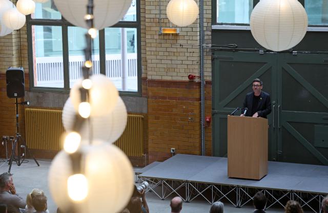 Labour MP and challenger for Leader of the Labour party, Andy Burnham, delivers a speech in Manchester, northern England, on June 29, 2026. Burnham, the frontrunner to become Britain's next prime minister, set out his economic agenda on Monday, in his first major policy announcement since Keir Starmer resigned as premier last week. (Photo by Toby Shepheard / AFP)