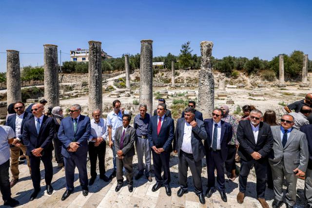 A group of foreign diplomats accredited by the Palestinian Authority visits the archaeological site of Sebastia, north of Nablus in the occupied West Bank, on June 29, 2026. (Photo by JAAFAR ASHTIYEH / AFP)