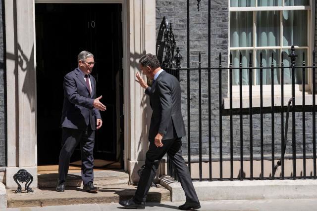 Britain's Prime Minister Keir Starmer (L) greets visiting NATO Secretary General Mark Rutte at 10 Downing Street before their meeting in central London on June 29, 2026. (Photo by CARLOS JASSO / AFP)