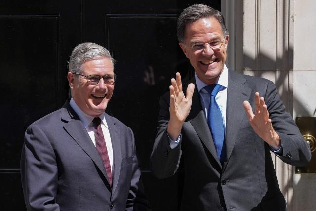 Britain's Prime Minister Keir Starmer (L) greets visiting NATO Secretary General Mark Rutte at 10 Downing Street before their meeting in central London on June 29, 2026. (Photo by CARLOS JASSO / AFP)
