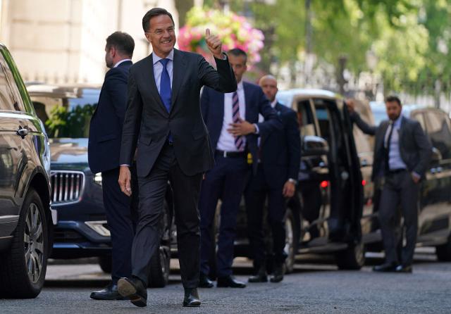 NATO Secretary General Mark Rutte makes a thumbs up gesture to media as he arrives in Downing Street in central London on June 29, 2026, for a meeting with Britain's Prime Minister. (Photo by Alberto Pezzali / POOL / AFP)