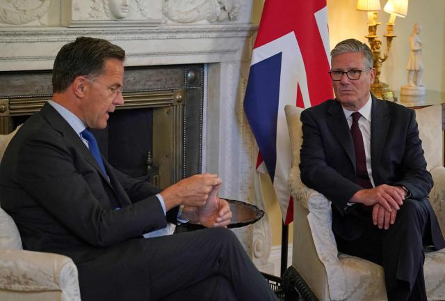 Britain's Prime Minister Keir Starmer (R) and NATO Secretary General Mark Rutte talk during their meeting inside 10 Downing Street in central London on June 29, 2026. (Photo by Alberto Pezzali / POOL / AFP)