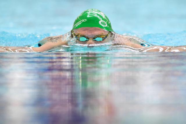 France’s Leo Marchand competes in a 200 metre men's breaststroke heat during the French national swimming championships in Saint-Etienne, central France on June 29, 2026. Lйon Marchand felt discomfort in a groin muscle during the 200m breaststroke heats and was forced to withdraw from the evening final of the event at the French Swimming Championships in Saint-Йtienne. (Photo by OLIVIER CHASSIGNOLE / AFP)