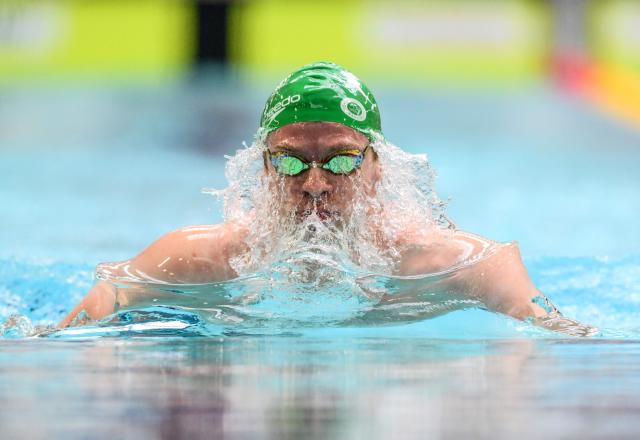 France’s Leo Marchand competes in a 200 metre men's breaststroke heat during the French national swimming championships in Saint-Etienne, central France on June 29, 2026. Lйon Marchand felt discomfort in a groin muscle during the 200m breaststroke heats and was forced to withdraw from the evening final of the event at the French Swimming Championships in Saint-Йtienne. (Photo by OLIVIER CHASSIGNOLE / AFP)