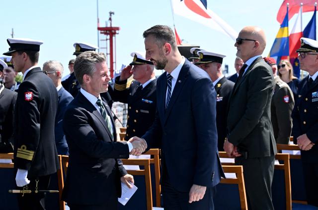Poland's Deputy Prime Minister and Defence Minister Wladyslaw Kosiniak-Kamysz (R) shakes hands with Sweden's Defence Minister Pal Jonson during a meeting in Gdynia, Poland on June 29, 2026. Sweden's Prime Minister Ulf Kristersson and several of his ministers travelled to Gdynia, Poland for intergovernmental consultations. The focus will be on strengthened bilateral cooperation between Sweden and Poland, specifically with regard to regional security and defence. (Photo by Marcin Gadomski / AFP)