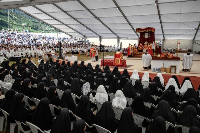 Priests and nuns attend an ordination ceremony of the traditionalist Catholic Society of Saint Pius X (SSPX), in Econe, near Sion, western Switzerland, on June 29, 2026. Defying Vatican, Society of Saint Pius X will ordain its own bishops on July 1, 2026, despite risk of being considered schismatic. (Photo by Fabrice COFFRINI / AFP)