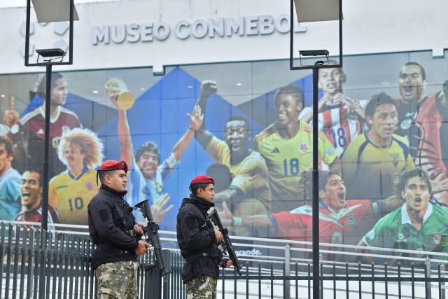 Soldiers stand guard outside the Conmebol headquarters during the 68th Mercosur Heads of State summit, in Luque, Paraguay on June 29, 2026. (Photo by DANIEL DUARTE / AFP)