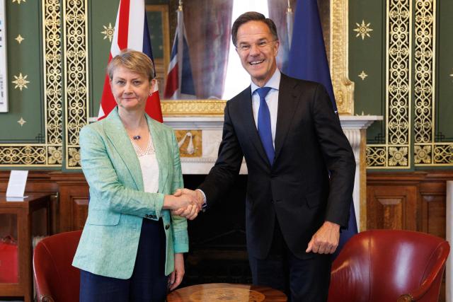 Britain's Foreign Secretary Yvette Cooper (L) and NATO Secretary General Mark Rutte (R) pose for a picture in the British Foreign and Commonwealth Office ahead of a meeting in central London on June 29, 2026. (Photo by Dan Kitwood / POOL / AFP)