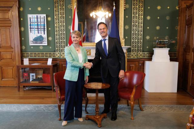Britain's Foreign Secretary Yvette Cooper (L) and NATO Secretary General Mark Rutte (R) pose for a picture in the British Foreign and Commonwealth Office ahead of a meeting in central London on June 29, 2026. (Photo by Dan Kitwood / POOL / AFP)