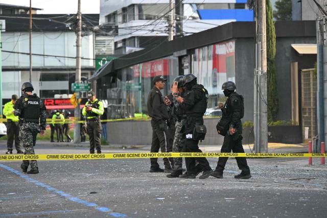 Police work outside the Ministry of Agriculture building, where a controlled explosion of a bomb was conducted, in Quito on June 29, 2026. Ecuadoran police conducted a controlled explosion of a bomb planted outside the Ministry of Agriculture shattering windows there. It was the second time in five days that a bomb has been found in the capital Quito, and comes as Ecuador grapples with rising violence by drug cartels. (Photo by Rodrigo BUENDIA / AFP)