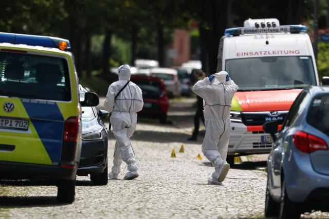 Forensic Police officers work near the scene where five people were killed in a shooting in Stade, northern Germany, a city some 50 kilometres west of Hamburg, on June 29, 2026. German police said five people were killed and others injured on June 29, 2026 in a shooting in a youth welfare facility in the northern city of Stade. Two people were arrested, including the suspected shooter, and there was now "no danger to the public", local police said in an update around 1215 GMT. (Photo by Ibrahim OT / AFP)