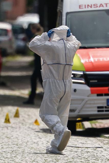 A forensic Police officer works near the scene where five people were killed in a shooting in Stade, northern Germany, a city some 50 kilometres west of Hamburg, on June 29, 2026. German police said five people were killed and others injured on June 29, 2026 in a shooting in a youth welfare facility in the northern city of Stade. Two people were arrested, including the suspected shooter, and there was now "no danger to the public", local police said in an update around 1215 GMT. (Photo by Ibrahim OT / AFP) / ALTERNATIVE CROP