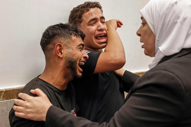 Relatives mourn the death of Amir Ahmad Jawad Jaber, a Palestinian teenager who was killed during an Israeli raid, at a hospital in Ramallah, in the Israeli-occupied West Bank on June 29, 2026. Israeli forces fatally shot a 15-year-old Palestinian teenager during a raid in the occupied West Bank on June 29, the Palestinian health ministry said, as violence surges in the Israeli-occupied territory. (Photo by Zain JAAFAR / AFP)