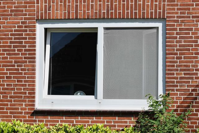 Picture taken on June 29, 2026 shows the window of a youth centre where a shooting took place in Stade, northern Germany, a city some 50 kilometres west of Hamburg. German police said six people were killed and others injured on June 29, 2026 in a shooting in a youth welfare facility in the northern city of Stade. Two people were arrested, including the suspected shooter, and there was now "no danger to the public", local police said in an update around 1215 GMT. (Photo by Ibrahim OT / AFP)