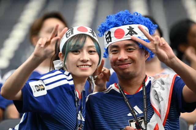 Japan's supporters pose ahead of the 2026 World Cup round of 32 football match between Brazil and Japan at the Houston Stadium in Houston on June 29, 2026.  (Photo by RONALDO SCHEMIDT / AFP)