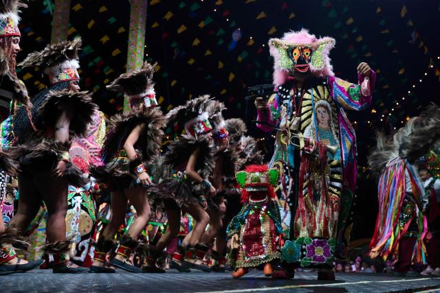 Members of a Batalhao (a dance and singing group) take part in a performance of the Bumba-Meu-Boi traditional festival, in Sao Luis, Maranhao State, northern Brazil, on June 25, 2026. Recognized by UNESCO as Intangible Cultural Heritage of Humanity, the Bumba-Meu-Boi festivities tell the legend of Pai Francisco and Mae Catirina, who sacrifice their employer’s favorite ox to fulfill the wish of his pregnant wife, culminating in the animal’s resurrection. (Photo by Antonello Veneri / AFP)