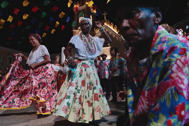 Members of a Batalhao (a dance and singing group) take part in a performance of the Bumba-Meu-Boi traditional festival, in Sao Luis, Maranhao State, northern Brazil, on June 26, 2026. Recognized by UNESCO as Intangible Cultural Heritage of Humanity, the Bumba-Meu-Boi festivities tell the legend of Pai Francisco and Mae Catirina, who sacrifice their employer’s favorite ox to fulfill the wish of his pregnant wife, culminating in the animal’s resurrection. (Photo by Antonello Veneri / AFP)