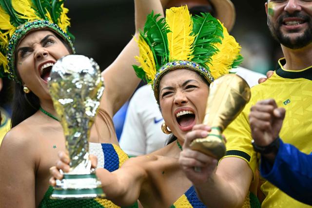 Brazil's supporters pose ahead of the 2026 World Cup round of 32 football match between Brazil and Japan at the Houston Stadium in Houston on June 29, 2026.  (Photo by Paul ELLIS / AFP)