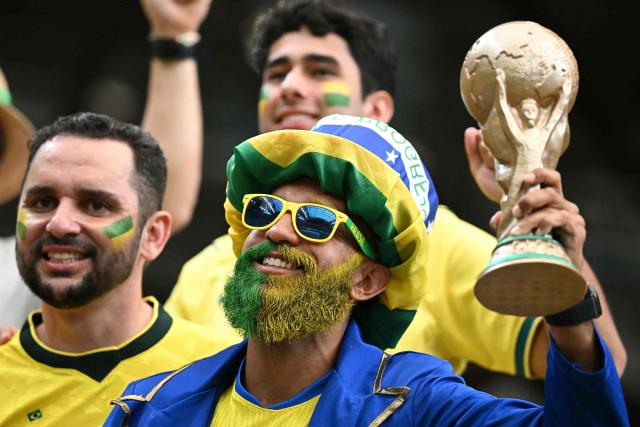 Brazil's supporters pose ahead of the 2026 World Cup round of 32 football match between Brazil and Japan at the Houston Stadium in Houston on June 29, 2026.  (Photo by Paul ELLIS / AFP)
