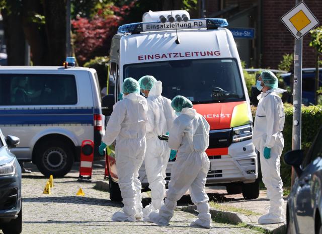 Police forensics work at the scene where six people were killed in a shooting in Stade, northern Germany, a city some 50 kilometres west of Hamburg, on June 29, 2026. A sixth person has died after a shooting at a youth centre in northern Germany on June 29, 2026, according to police, who said that the deadly shooting likely stems from "an extended family tragedy". All six of those killed in the shooting are adults, and one further person injured in the shooting is being treated but is "stable," a police spokesman told AFP. A male suspected shooter has been arrested, and two other people are being held in police custody whose connection with the deadly shooting remains under investigation, according to police. (Photo by Ibrahim OT / AFP)