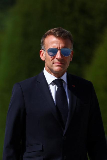 France's President Emmanuel Macron looks on during a welcoming ceremony for Thailand's King Maha Vajiralongkorn and Queen Suthida (not pictured) in the courtyard of the Hotel des Invalides in Paris on June 29, 2026, as part of an official state visit of the Thai King to France. The King of Thailand is visiting France from June 28 to July 2, the first by a Thai monarch to France since 1960, marking the 170th anniversary of the establishment of diplomatic relations between the two countries. (Photo by Abdul Saboor / POOL / AFP)