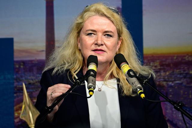 Kristin Brinker, the far-right Alternative for Germany party's top candidate for the regional elections in Berlin speaks at a campaign rally in front of the Berlin City Hall on June 29, 2026. (Photo by Tobias SCHWARZ / AFP)