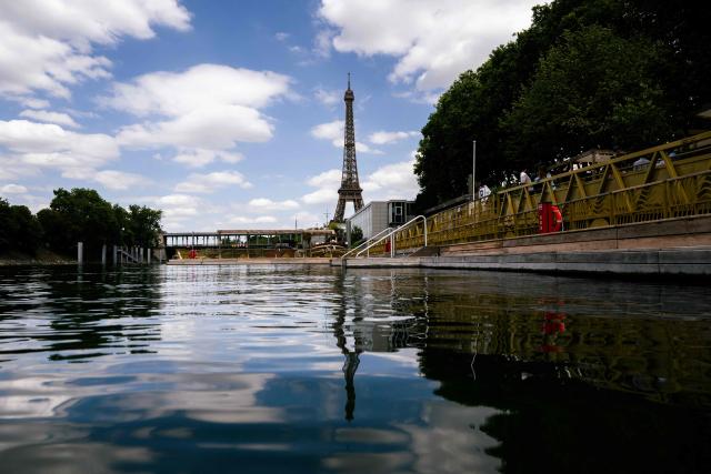 This photograph shows the Seine river at the Baignade de Grenelle Baignade safe swimming site with the Eiffel Tower in the background, in Paris on June 29, 2026. The Baignade de Grenelle Baignade safe swimming will open on July 4, 2026. (Photo by Julie SEBADELHA / AFP)